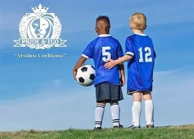 Two boys wearing soccer uniforms